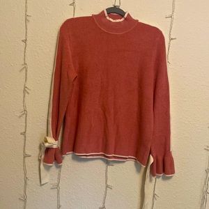 pink bow sleeve turtleneck sweater